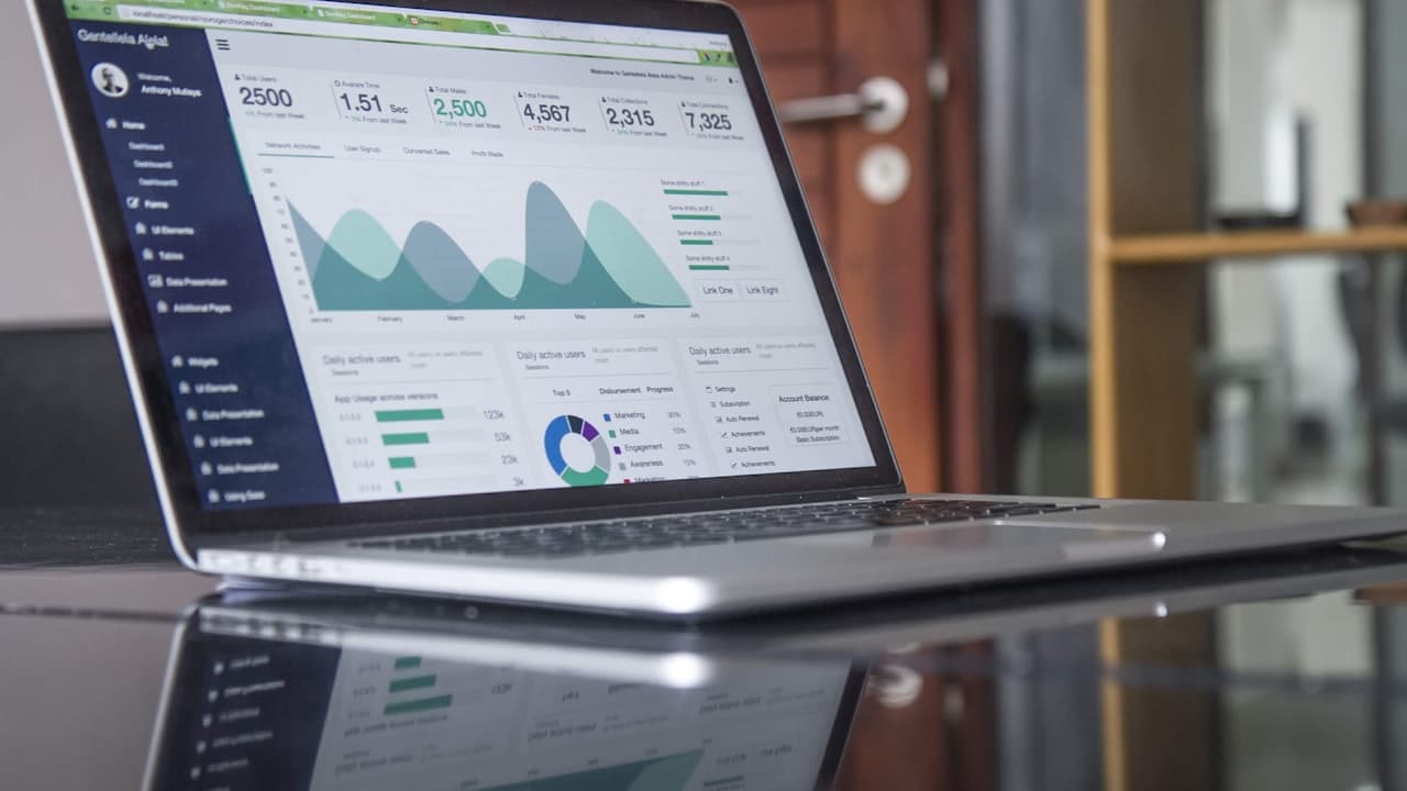 Financial analyst reviewing real-time credit decision dashboard with AI predictions